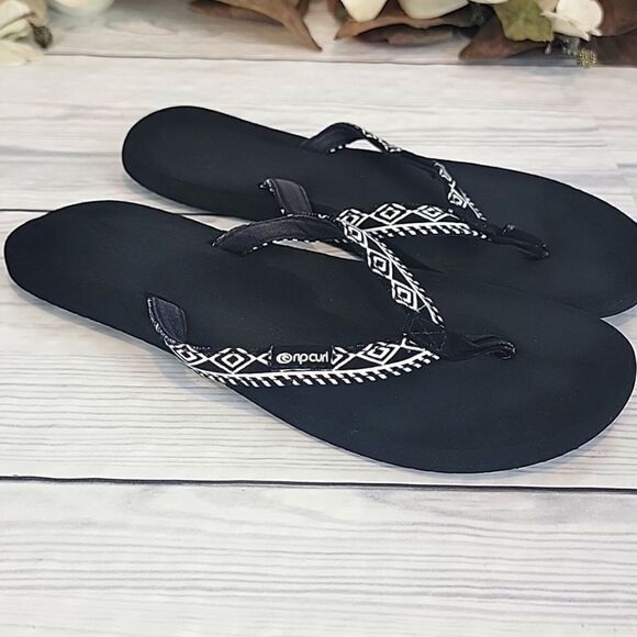 Rip Curl Shoes - Rip Curl Freedom flip flops black and white Women's Size 8